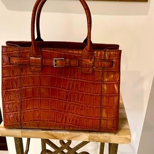 Luggage color, embossed crocodile, pattern with center & side pockets Worn once